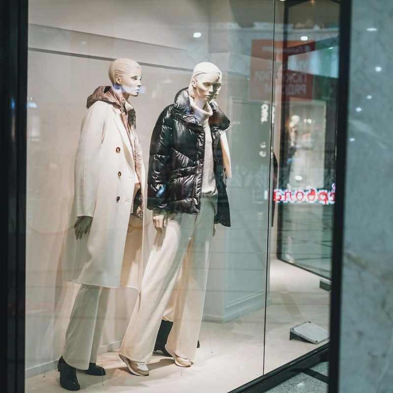 Shop window in shopping mall, retail clothing store luxe brand